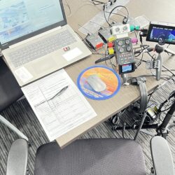 Deposition recording gear in use on conference room table