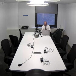 Deposition recording gear in use on conference room table