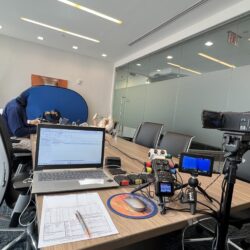 Deposition recording gear in use on conference room table