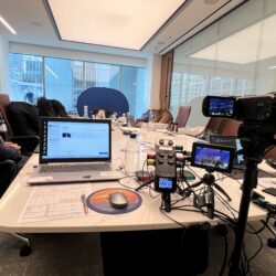 Deposition recording gear in use on conference room table