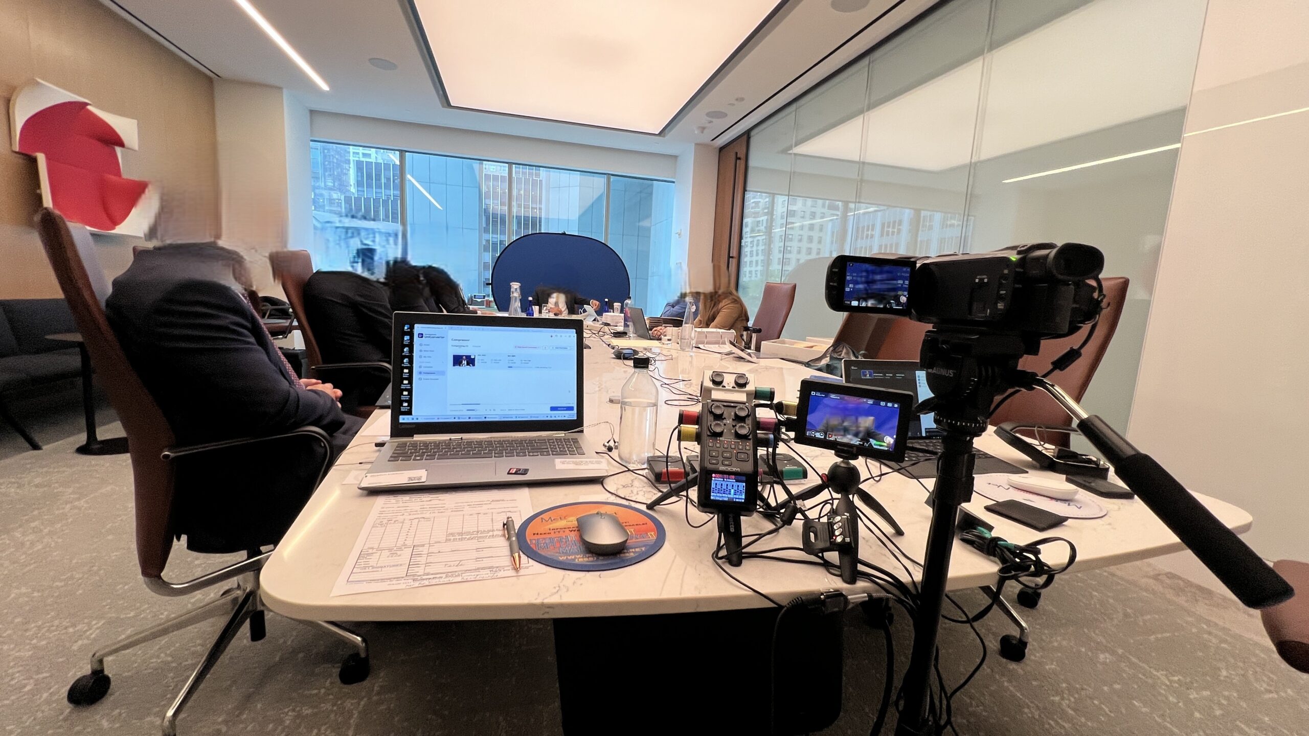 Deposition recording gear in use on conference room table