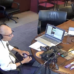 Deposition recording gear in use on conference room table