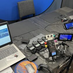 Deposition recording gear in use on conference room table