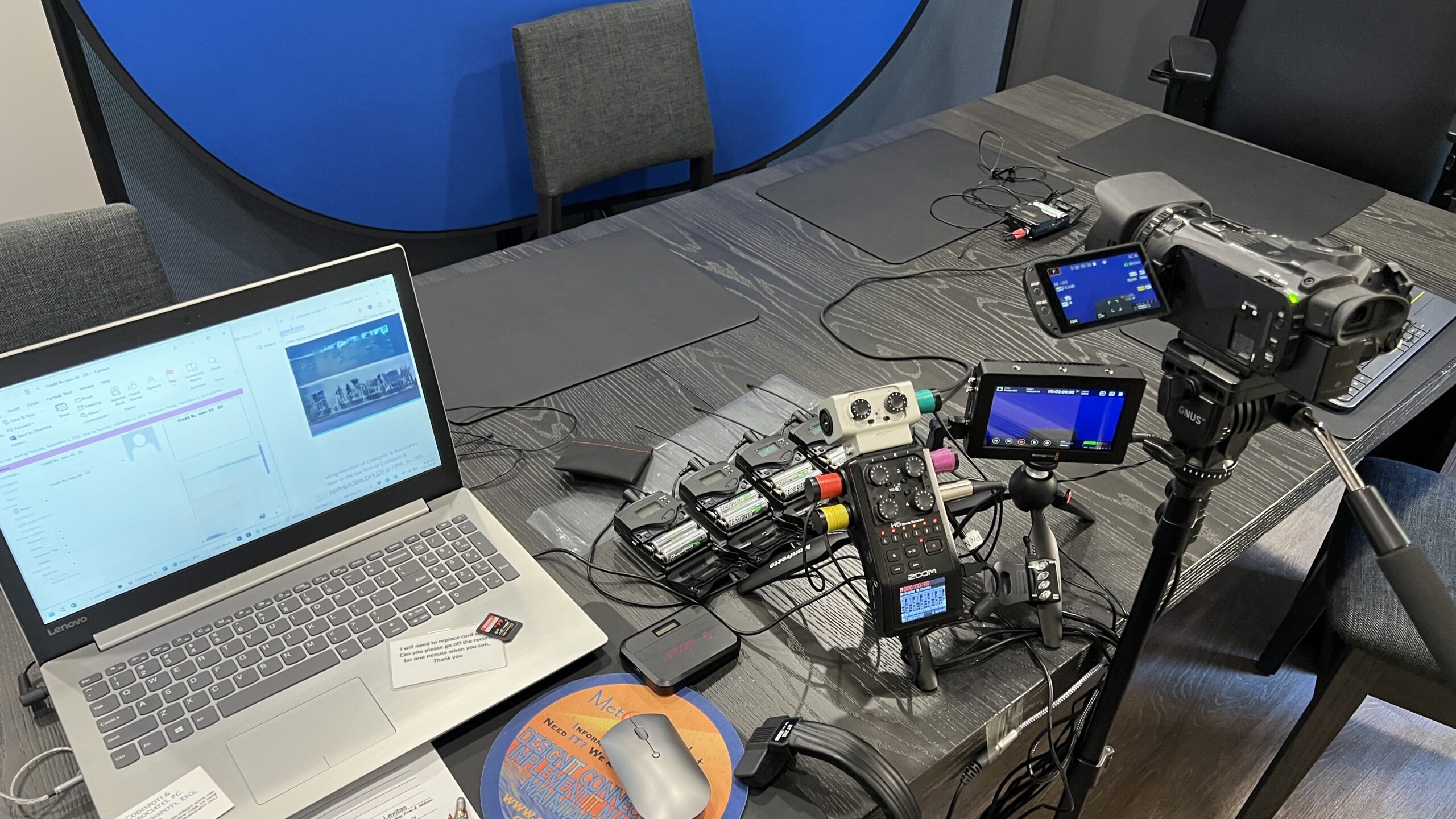 Deposition recording gear in use on conference room table