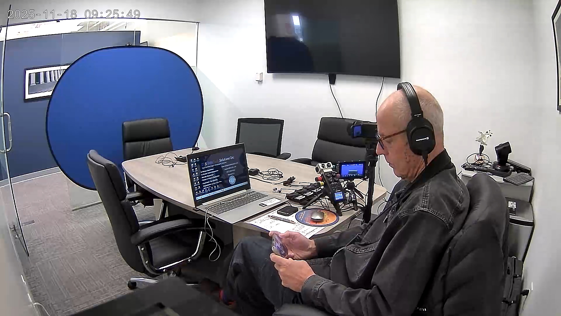 Deposition recording gear in use on conference room table