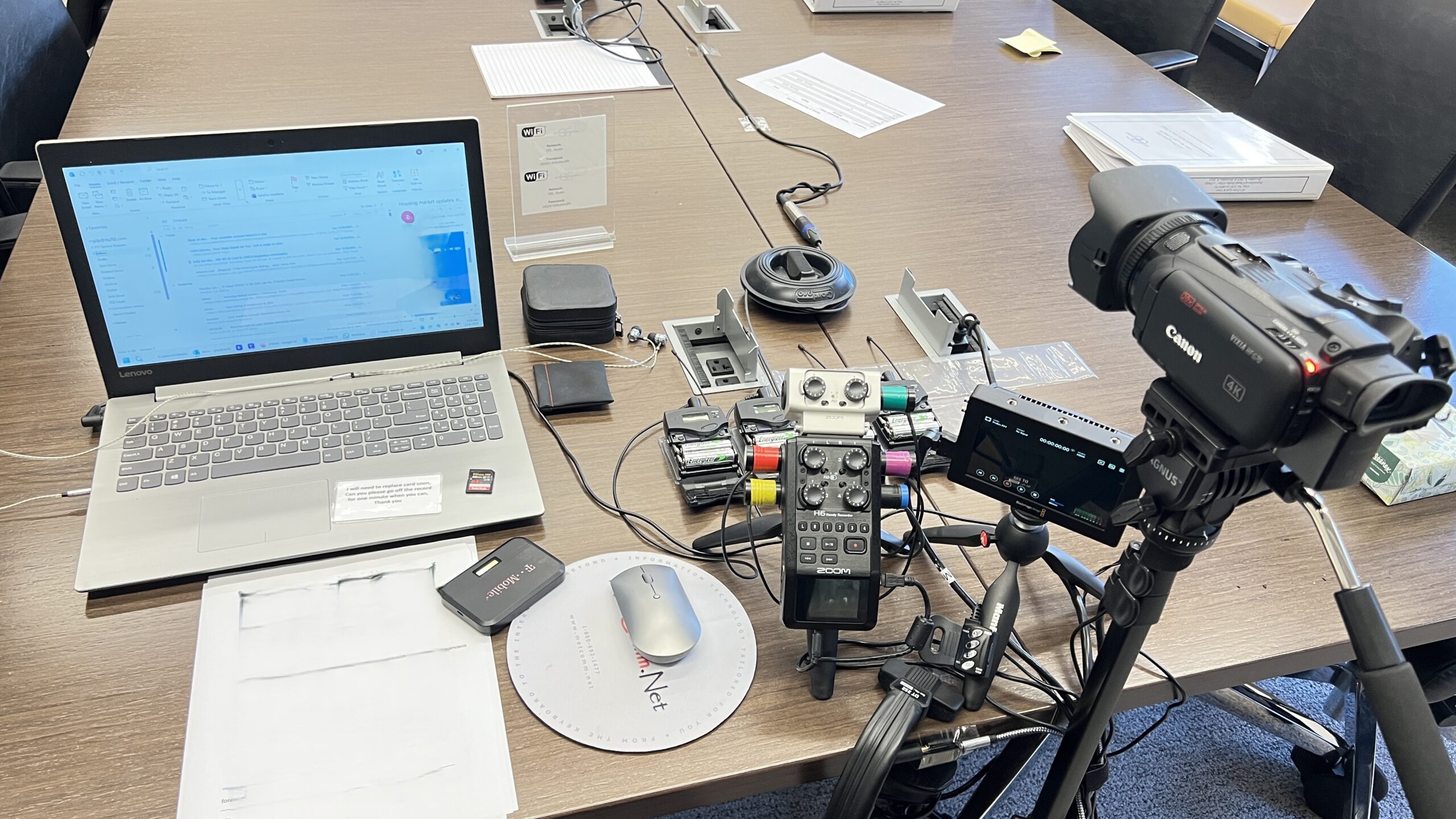 Deposition recording gear in use on conference room table