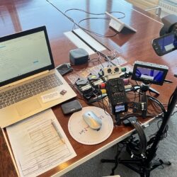 Deposition recording gear in use on conference room table