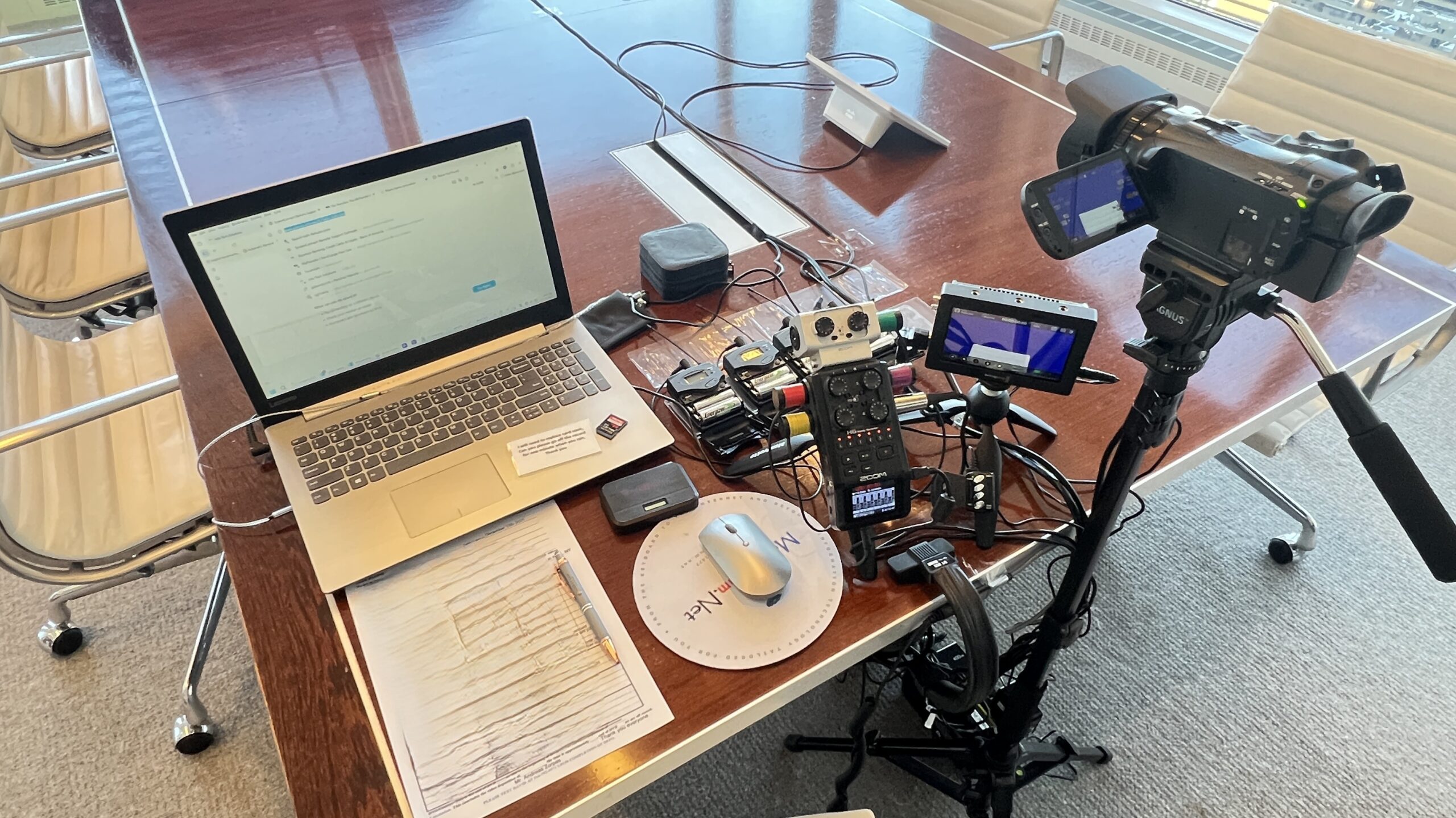 Deposition recording gear in use on conference room table