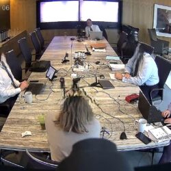 Deposition recording gear in use on conference room table