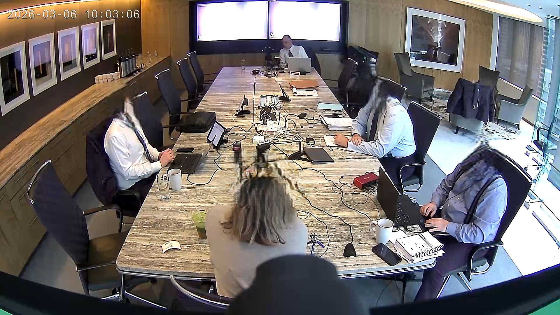 Deposition recording gear in use on conference room table