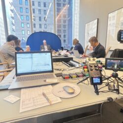 Deposition recording gear in use on conference room table
