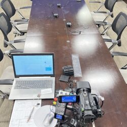 deposition gear in use on conference room table