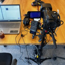 Deposition recording gear in use on conference room table