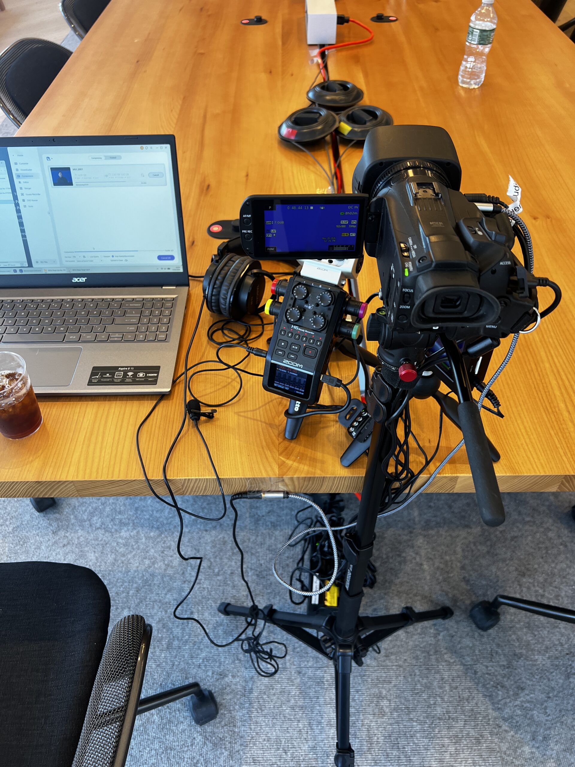 Deposition recording gear in use on conference room table