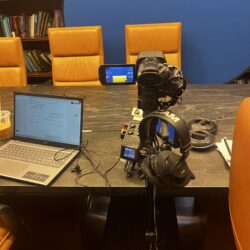 Deposition recording gear in use on conference room table