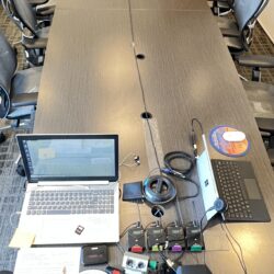Deposition recording gear in use on conference room table