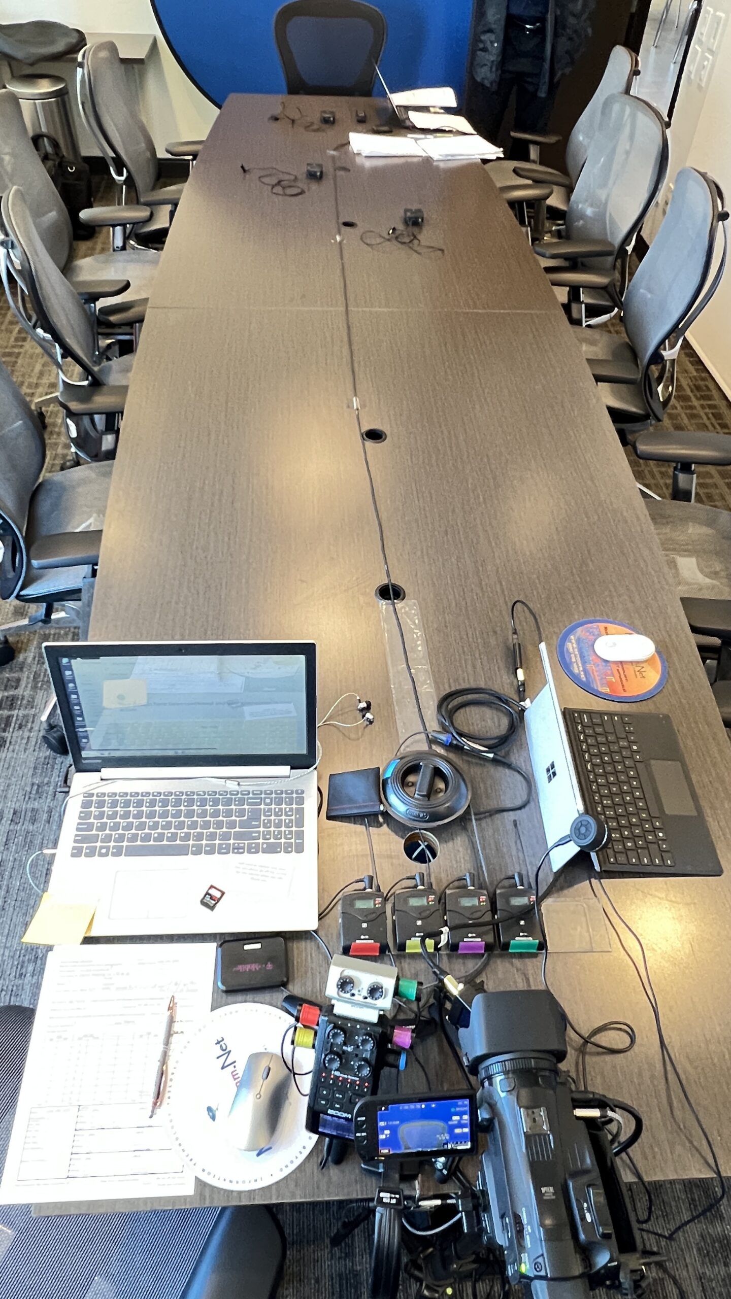 Deposition recording gear in use on conference room table