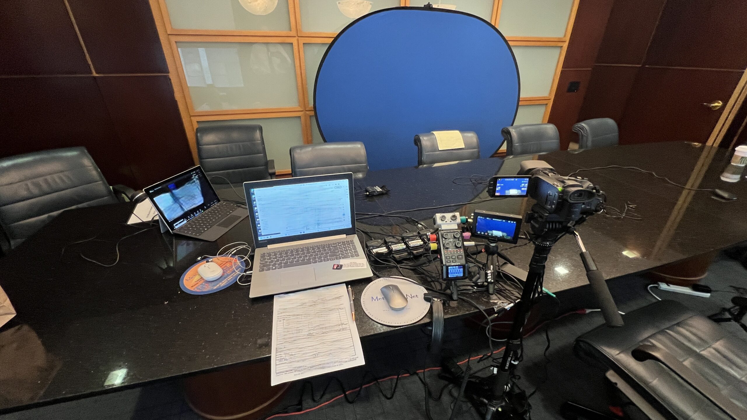 Deposition recording gear in use on conference room table