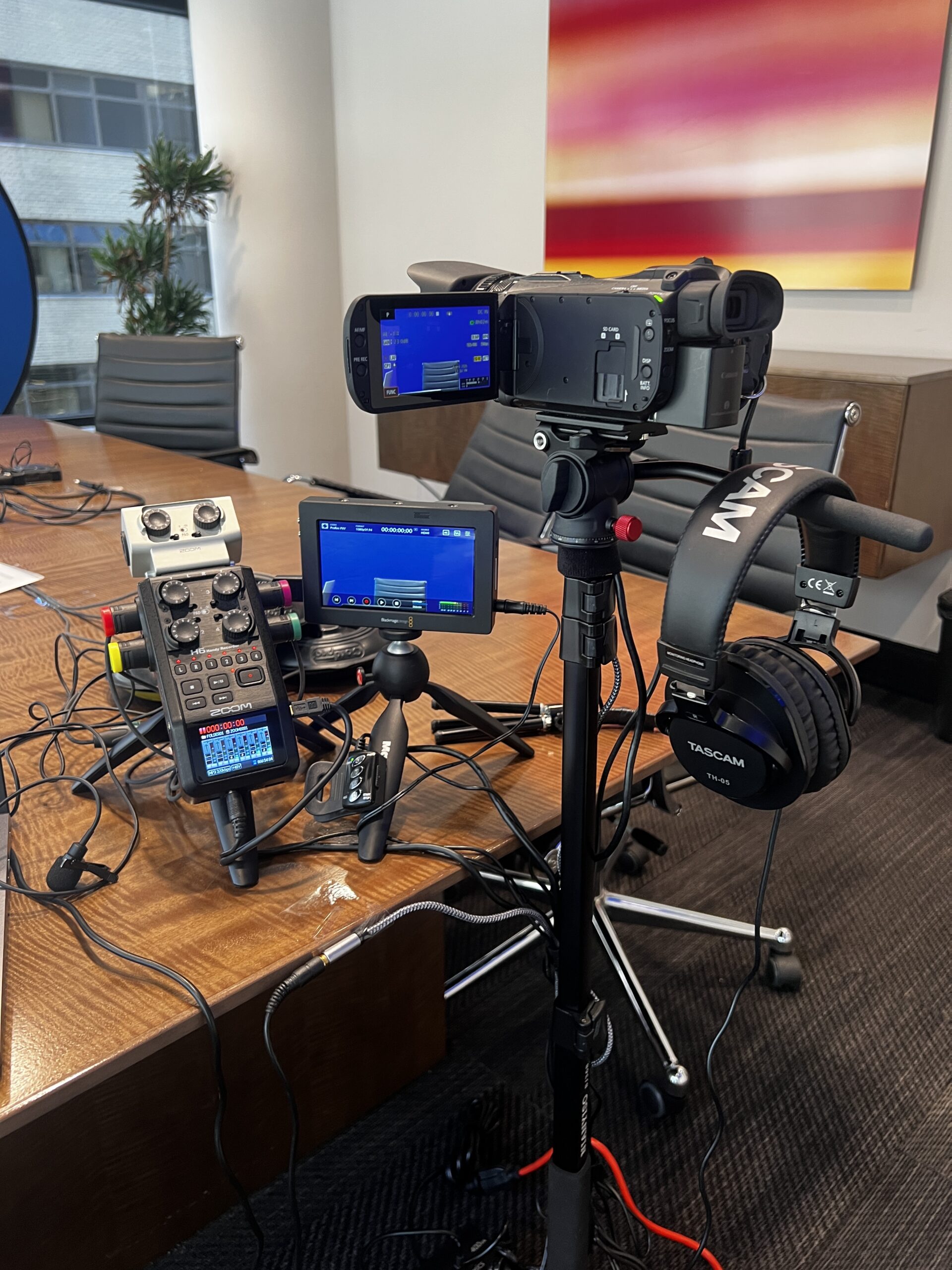 Deposition recording gear in use on conference room table