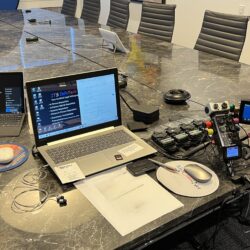 Deposition recording gear in use on conference room table