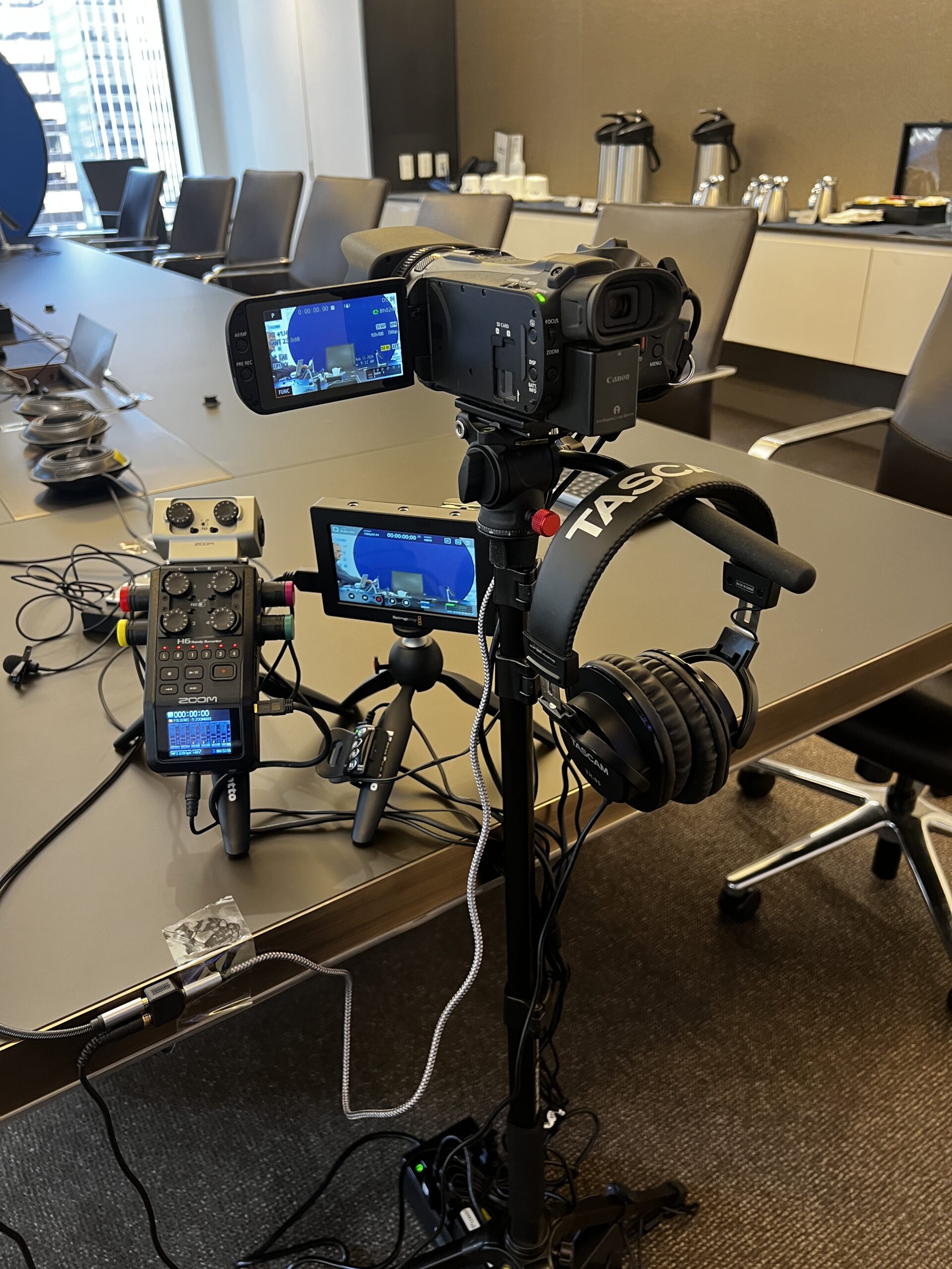 Deposition recording gear in use on conference room table